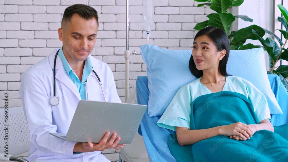 Doctor in professional uniform examining patient at hospital or medical clinic. Health care , medica