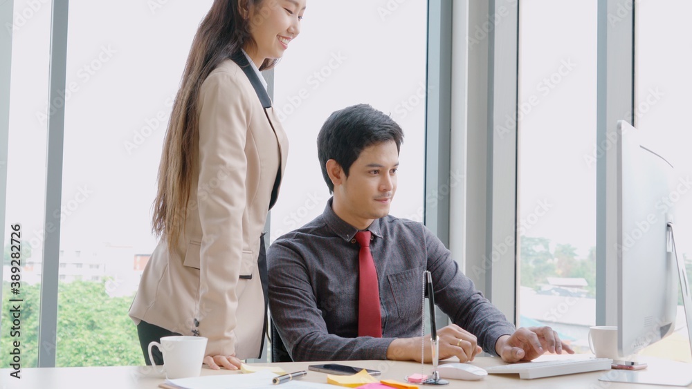 Two business people talk project strategy at office meeting room. Businessman discuss project planni