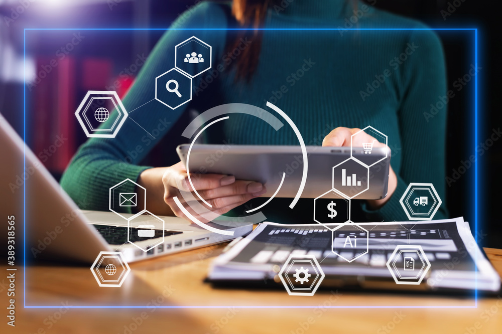  Businessman working with smart phone and laptop and digital tablet computer in  office with digital