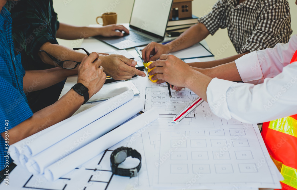 Team of architects working on the design and planning of construction projects.