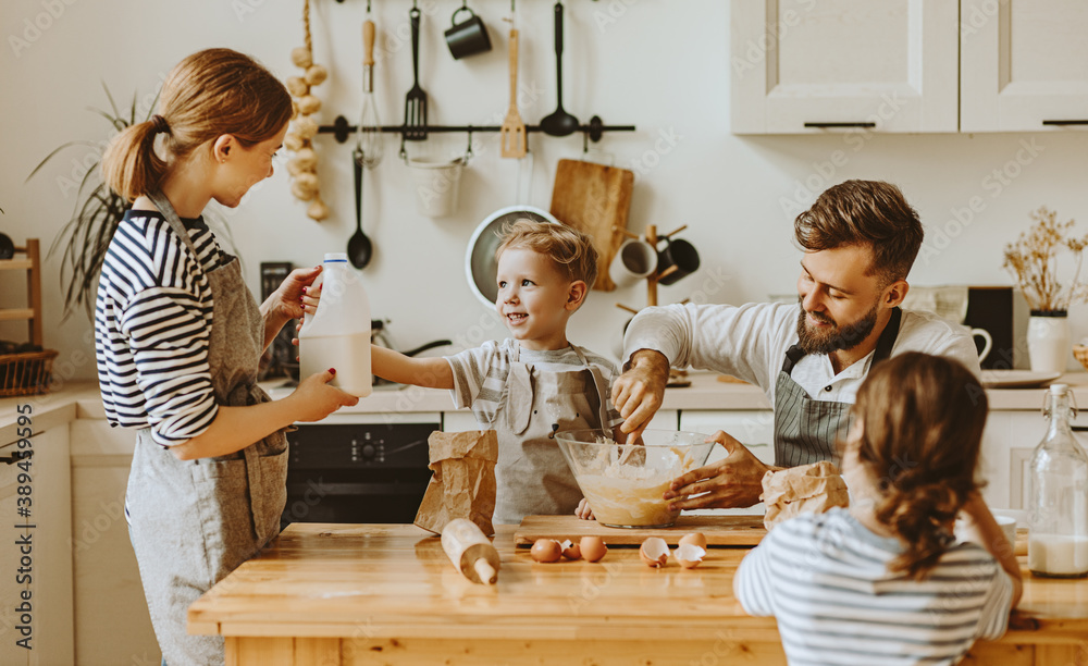 Positive family preparing pastry together.