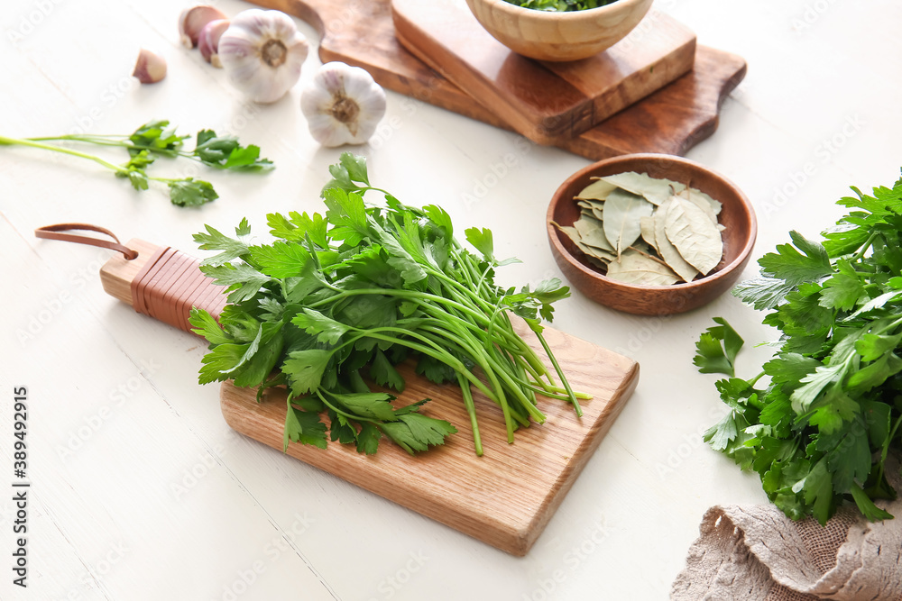 Composition with fresh parsley on table