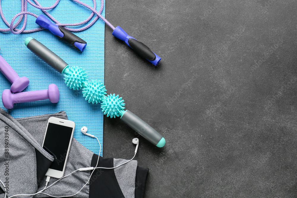 Sports equipment with body roller on dark background