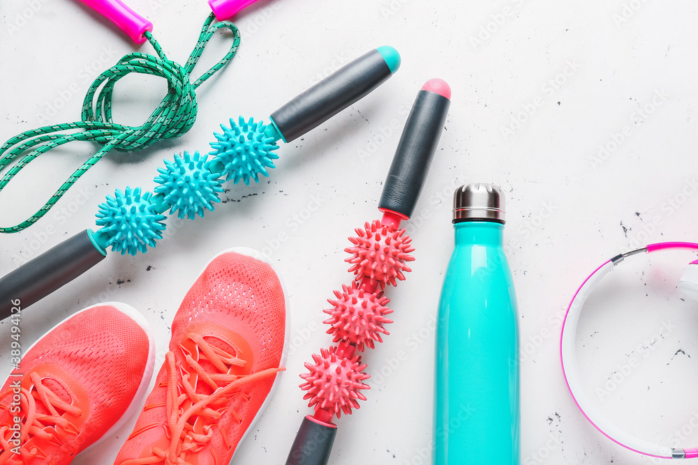 Sports equipment with body rollers on white background