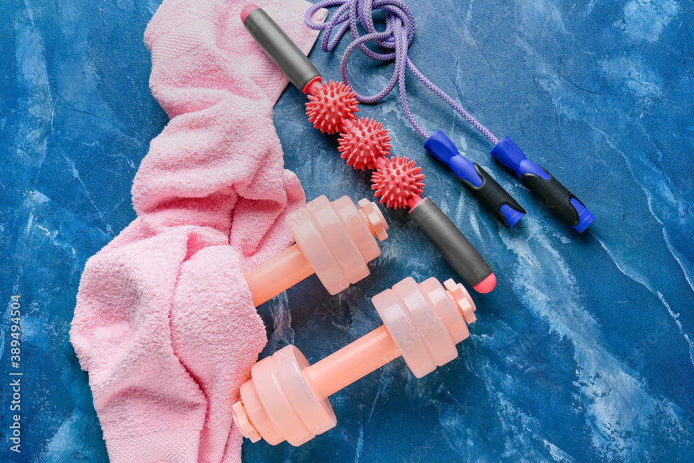 Sports equipment with body roller on color background