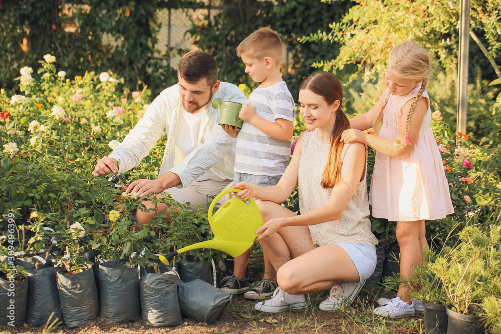 Young family working in garden