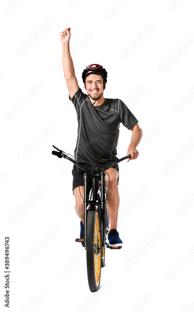 Male cyclist riding bicycle on white background