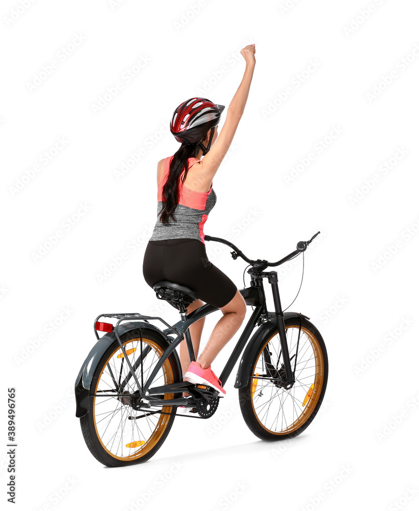 Female cyclist riding bicycle on white background