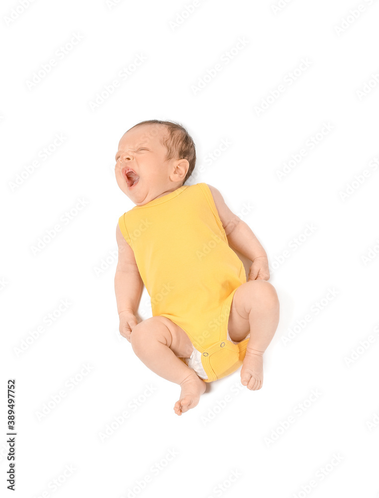 Cute little baby lying on white background