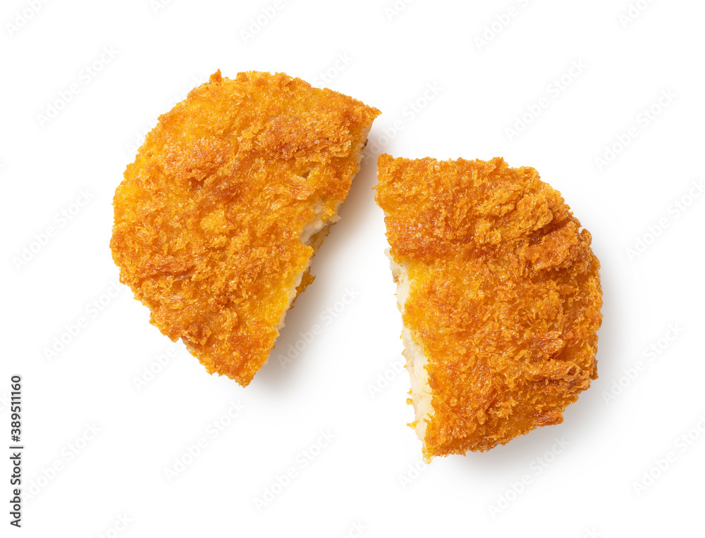 A cut croquette placed on a white background