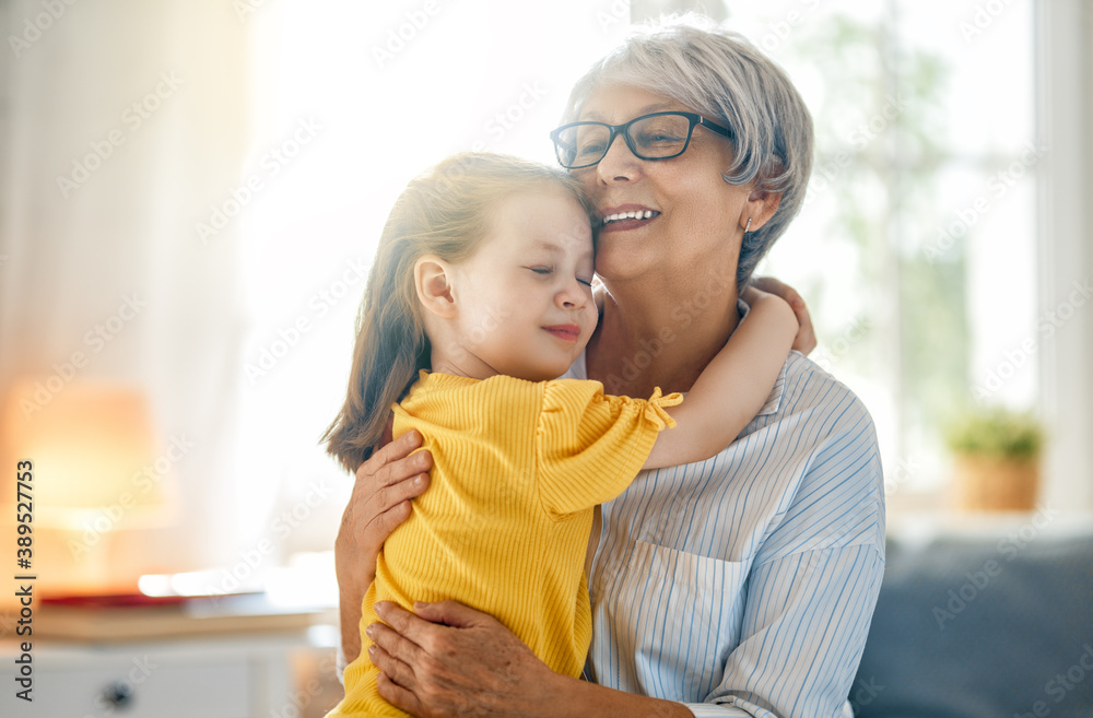 girl and her grandmother enjoying sunny morning