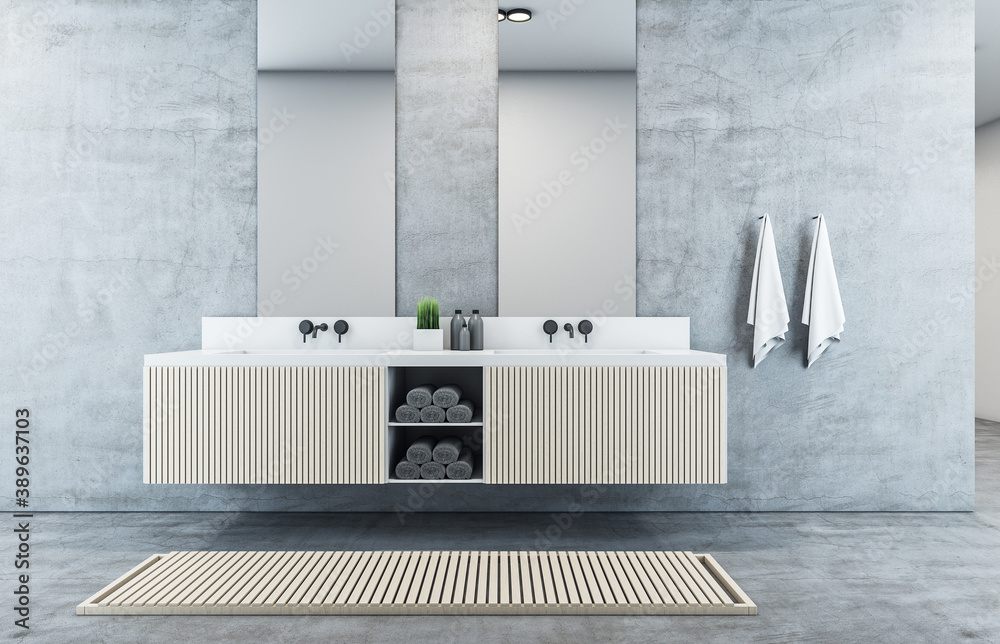 Contemporary bathroom interior with concrete wall, mirror and sink.