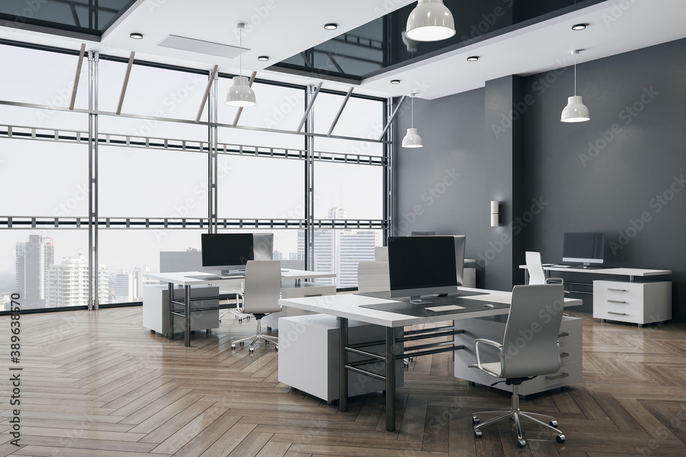 Modern coworking office interior with computers