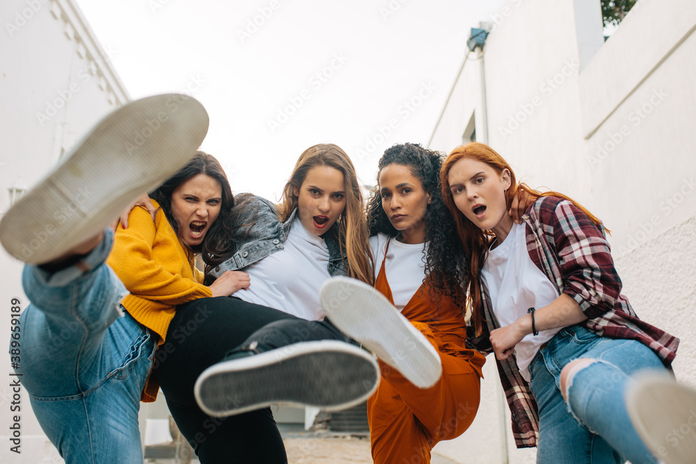 Female friends having fin outdoors