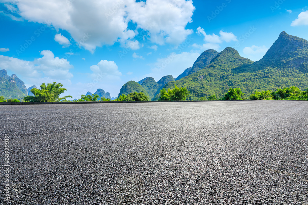 Asphalt highway and green mountain natural scenery in Guilin,China.