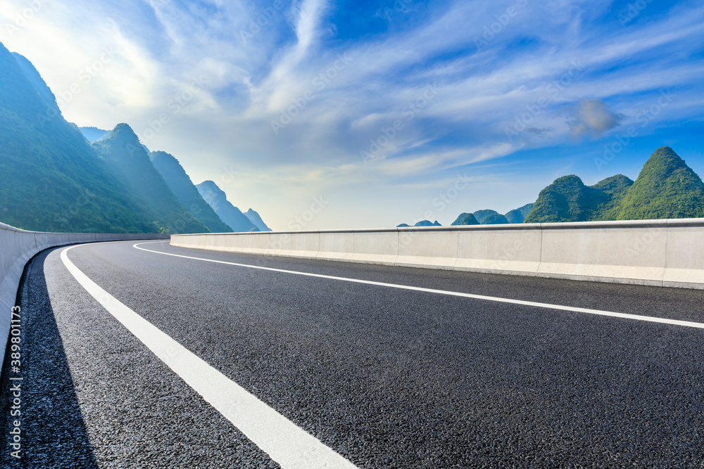 Asphalt highway and green mountain natural scenery in Guilin,China.