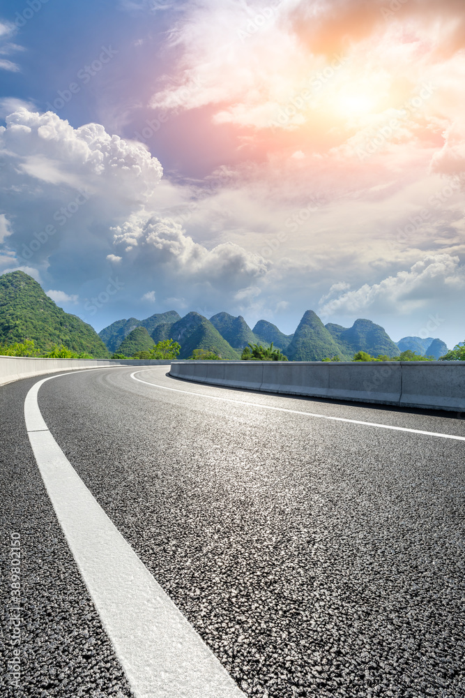 Asphalt highway and green mountain natural scenery in Guilin,China.