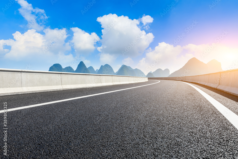 Asphalt highway and green mountain natural scenery in Guilin,China.