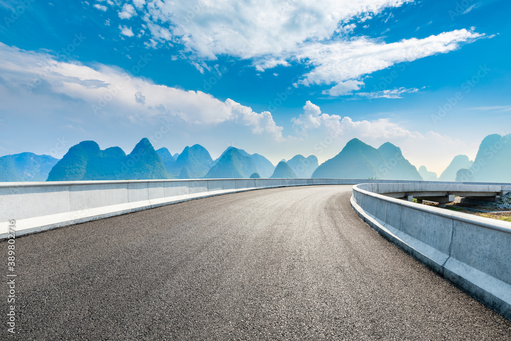 Asphalt highway and green mountain natural scenery in Guilin,China.