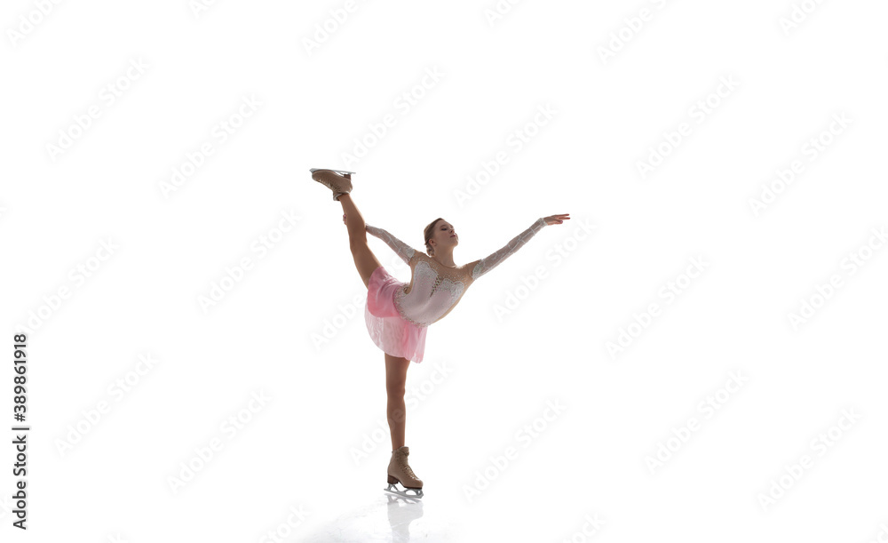 Figure skating girl in ice arena isolated on white.