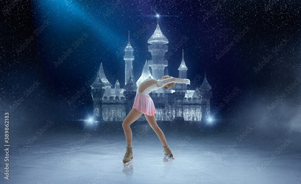 Figure skating girl in ice arena.