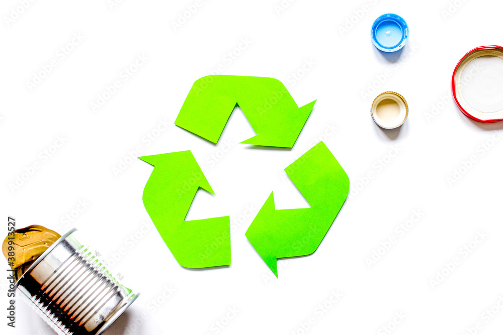 recycling symbol with waste on white background top view mock up