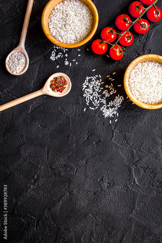 ingredients for paella on dark background top view