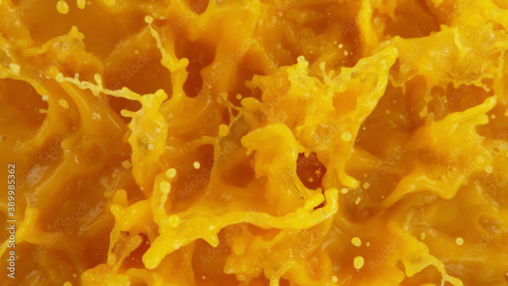 Closeup of splashing orange juice