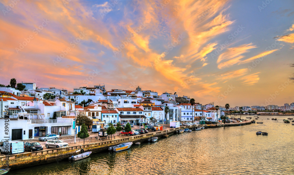 Ferragudo, a traditional fishing village at sunset. Algarve, Portugal