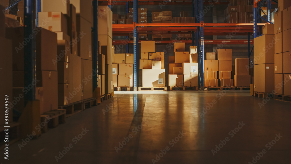 Gigantic Retail Warehouse full of Shelves with Goods in Cardboard Boxes. Logistics and Distribution 