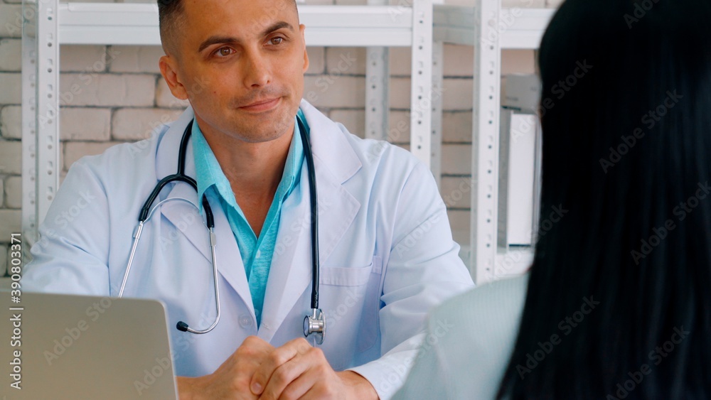 Doctor in professional uniform examining patient at hospital or medical clinic. Health care , medica