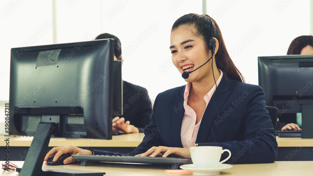 Business people wearing headset working in office to support remote customer or colleague. Call cent