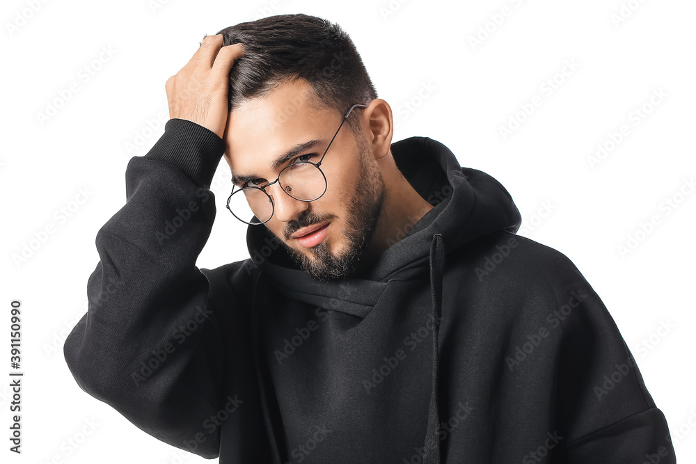 Fashionable young man on white background