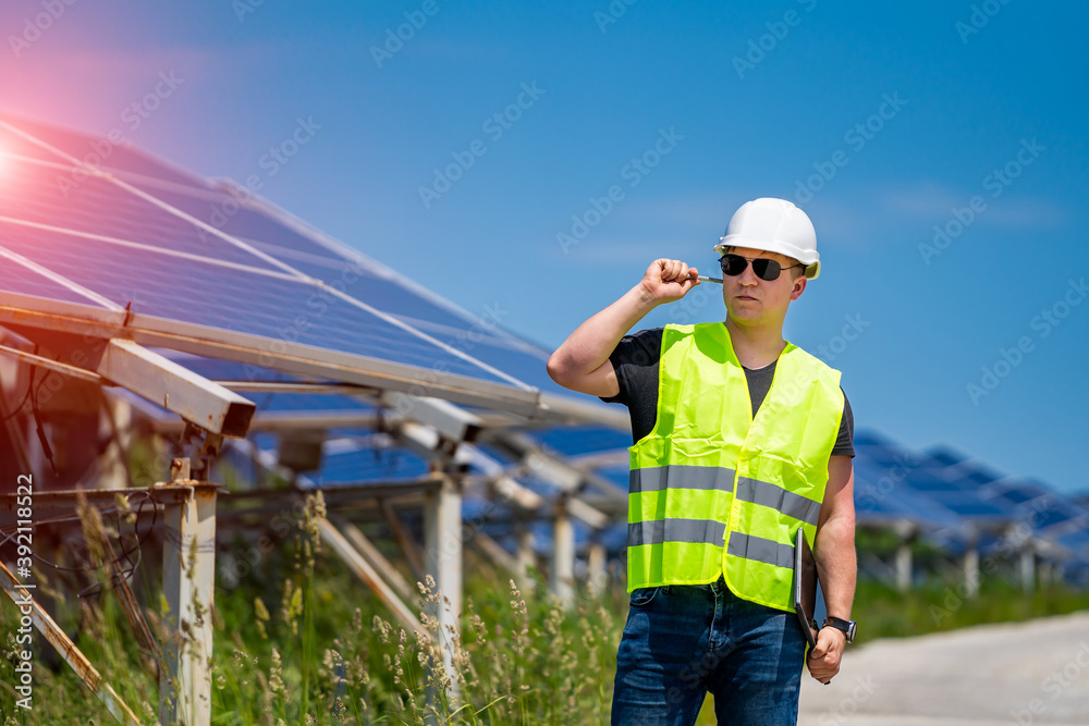 Solar power panel. Green energy. Electricity. Power energy pannels. Engineer on a solar plant.