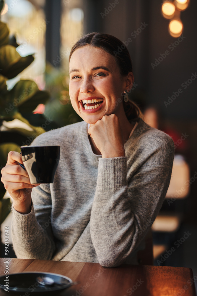 Woman enjoying at a coffee shop