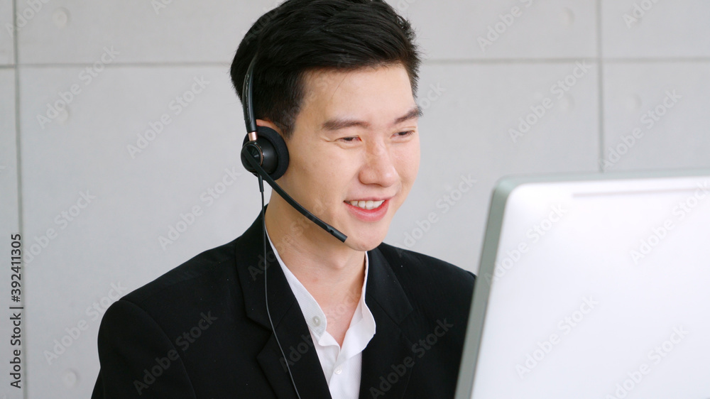 Business people wearing headset working in office to support remote customer or colleague. Call cent