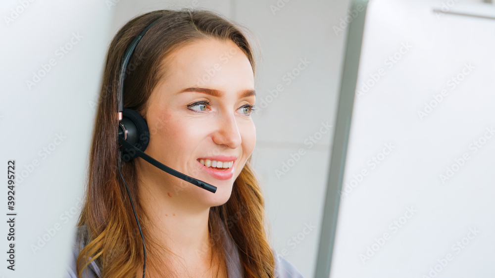 Business people wearing headset working in office to support remote customer or colleague. Call cent