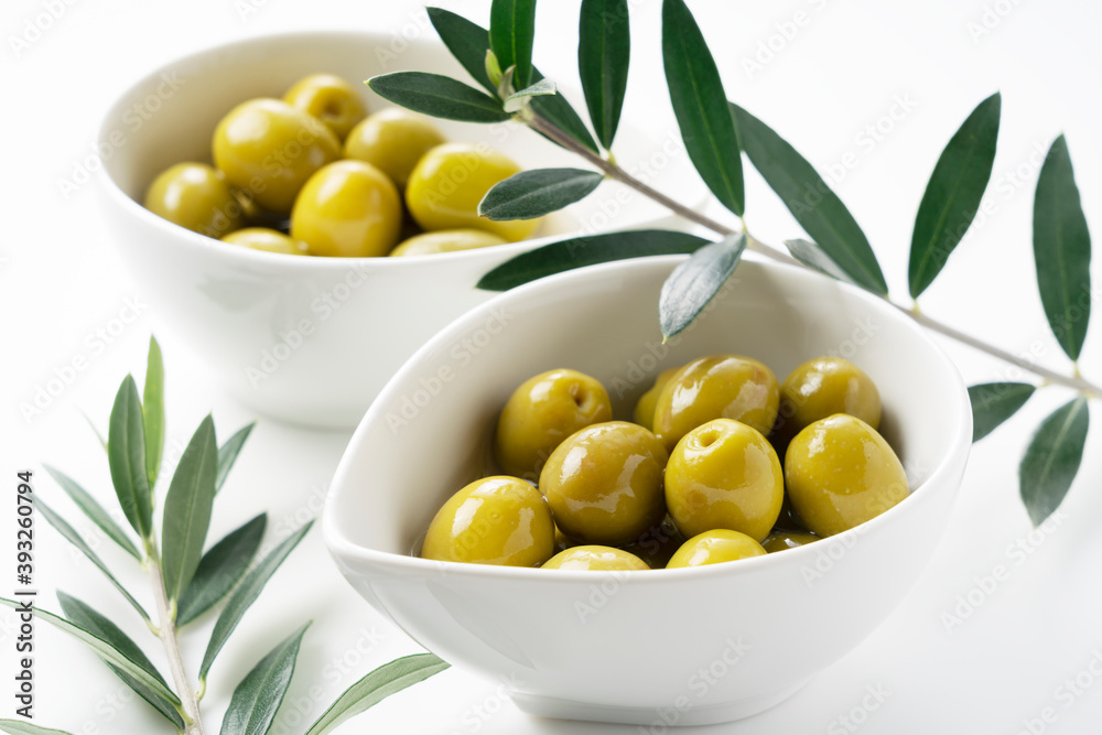 Salted olives placed on a white background