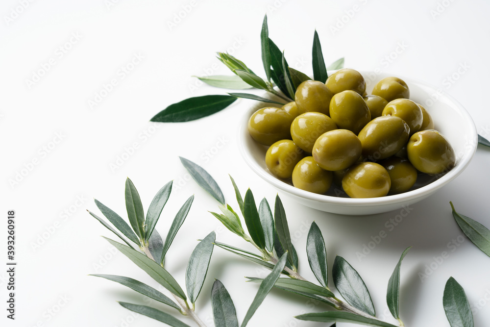 Salted olives placed on a white background