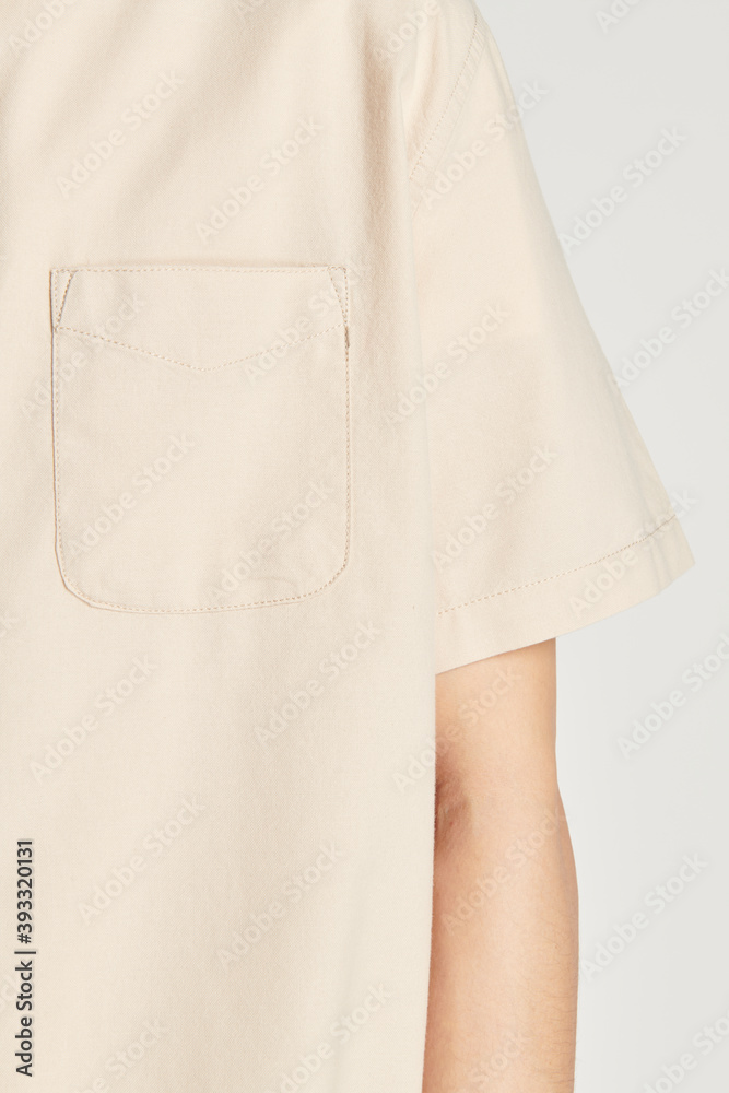 Man in a beige shirt pocket mockup