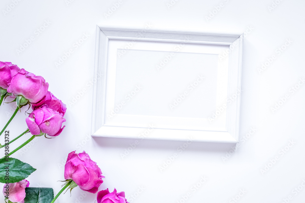 present design with peony bouquet and white frame top view mock up