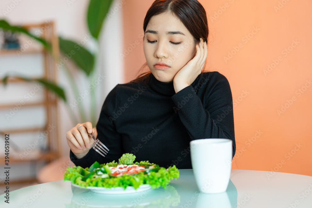 the bored woman does not want to eat