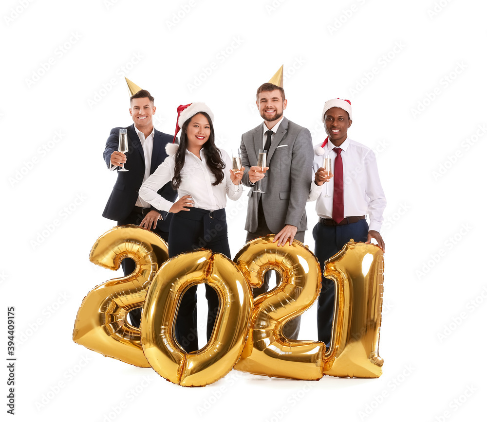 Young people with glasses of champagne and air balloons on white background. Happy Near Year celebra