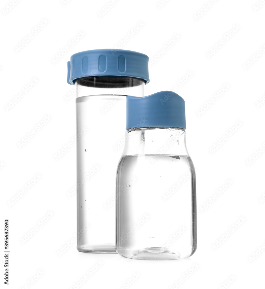 Bottles of clean water on white background