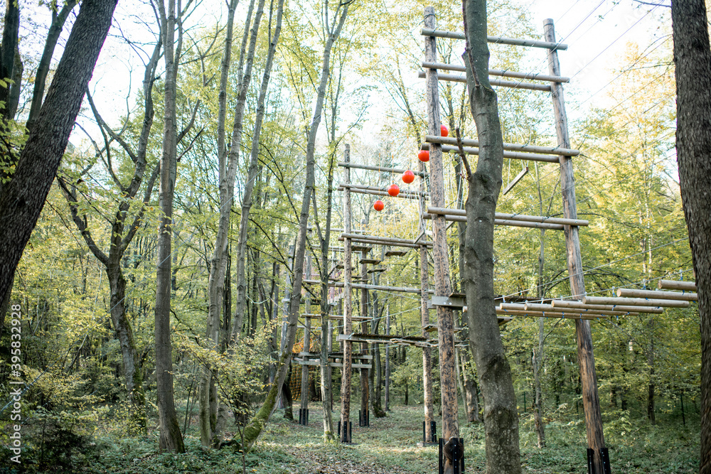 Rope park with obstacles in the forest