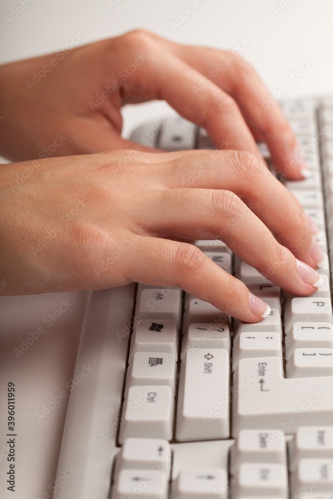 Hands Typing on a Keyboard