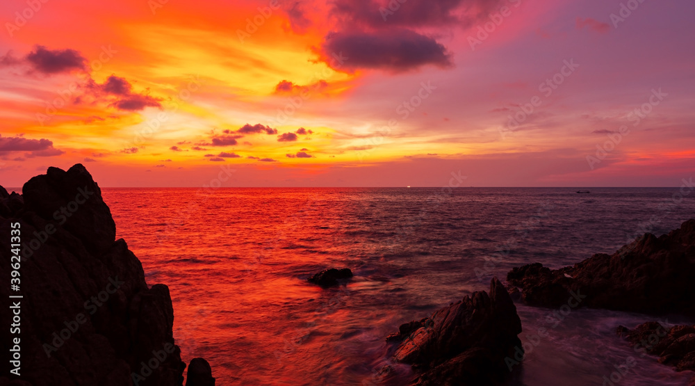 Landscape Long exposure of colorful color majestic clouds in the sky sunset or sunrise over sea with