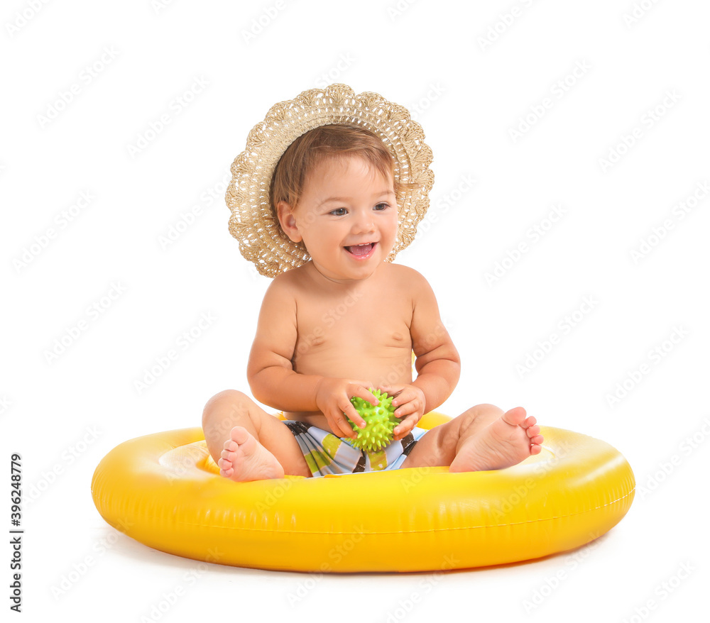 Cute baby boy with inflatable ring on white background