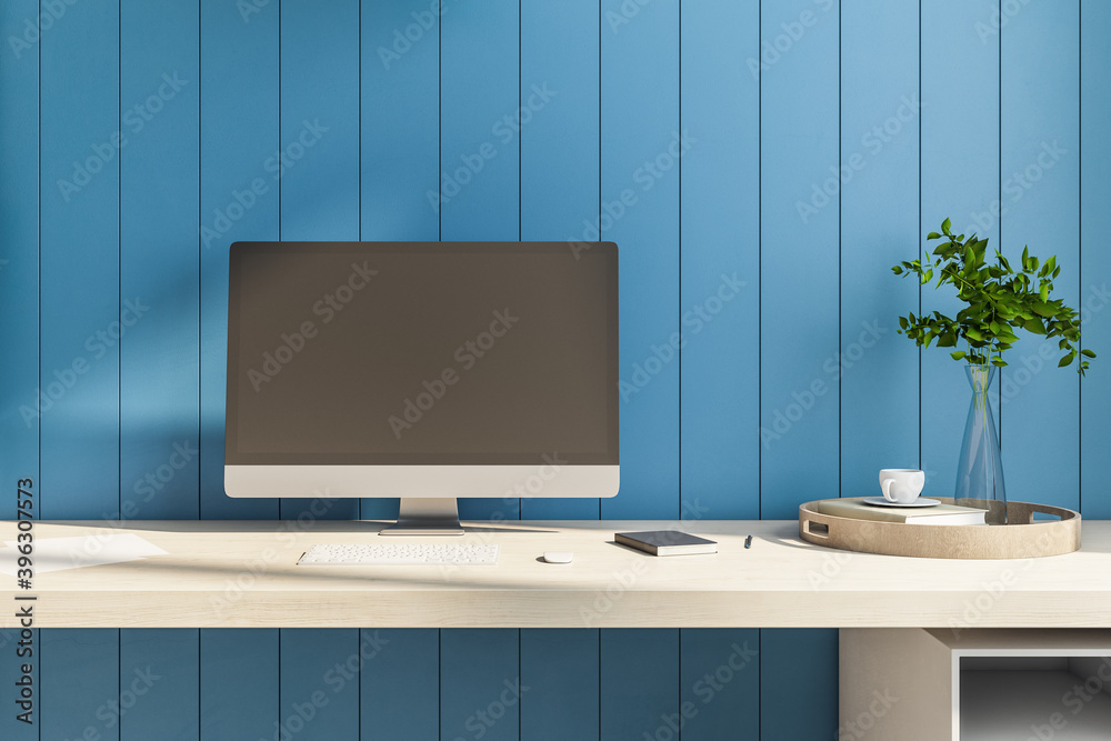 Creative designer table with blank computer screen