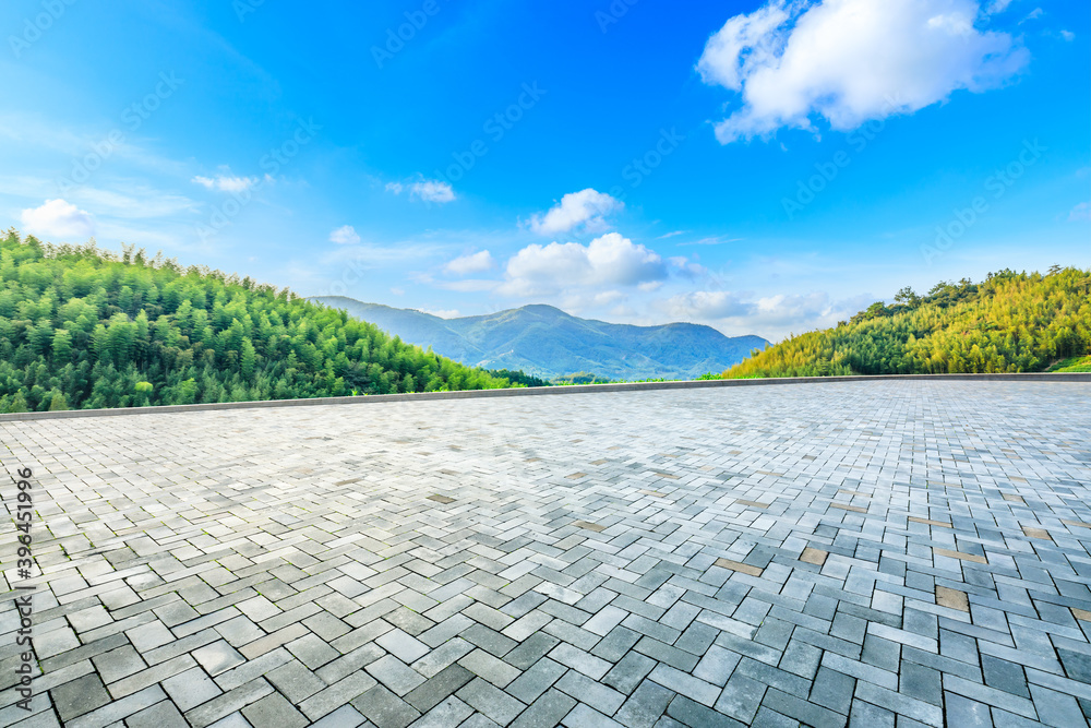 Empty square floor and green mountain with bamboo forest natural landscape.